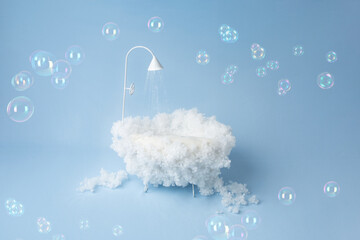 children's holiday decoration of the photo zone. small baby bath with foam. background texture the first photo session of a newborn