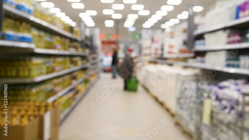 Wallpaper Mural Blurred background of grocery store and people in the supermarket Torontodigital.ca