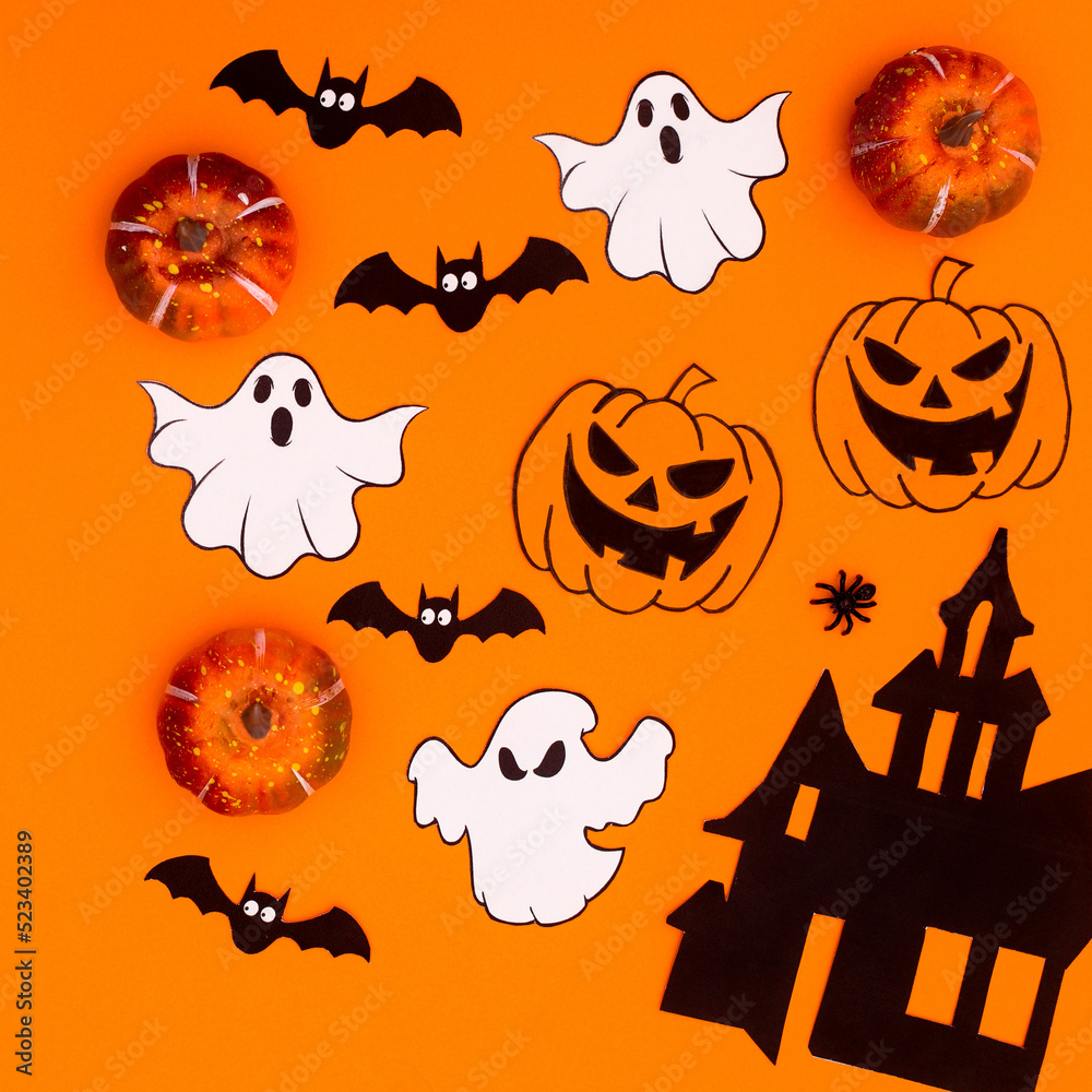 Creepy stickers for Halloween holidays on orange background. Flat lay