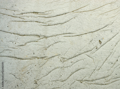 Cracked concrete. Concrete texture with cracks. Gray asphalt. The old texture is broken.