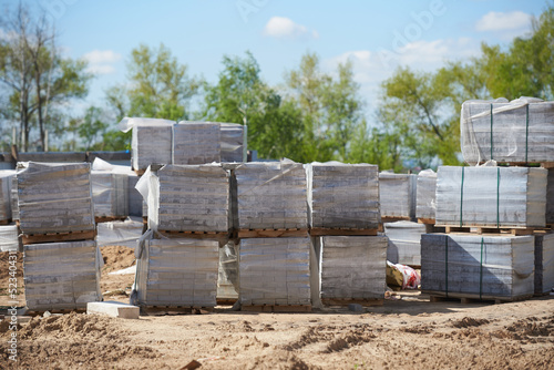 Packed pavement tiles at construction site