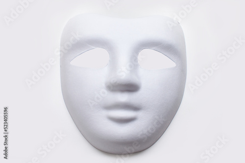 white carnival mask on white background