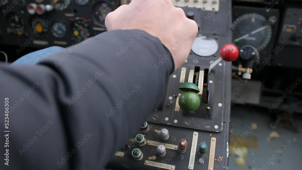 Pilot push thrust lever handle for takeoff a old plane in the cockpit ...
