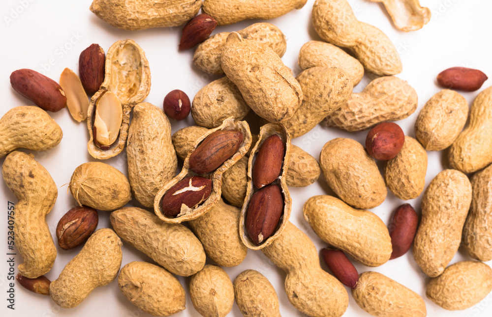 Obraz premium bunch of ecological peanuts on a white background