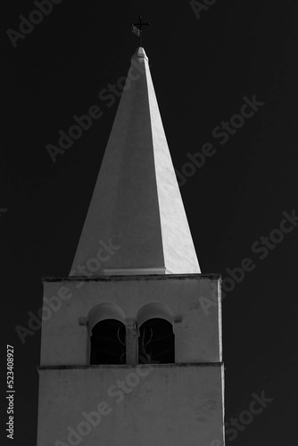 tower of the euphrasian basilica in porec  croatia  black and white