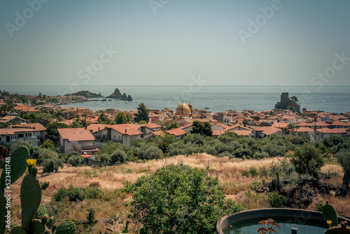 The coast between Aci Trezza and Aci Castello, Catania Province, Sicily, Italy. photo