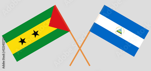 Crossed flags of Sao Tome and Principe and Nicaragua. Official colors. Correct proportion