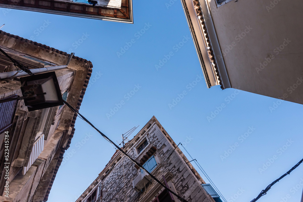 old houses in the city of rovinij with sky