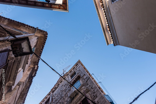 old houses in the city of rovinij with sky