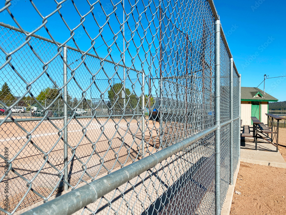 baseball dugout fence softball sports field public park school fencing Stock Photo Adobe Stock
