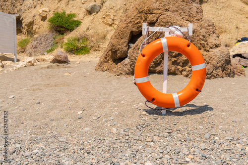 Life red sunset equipment protection buoy lifebuoy rescue lifesaver ring, from safe danger from guard from sea orange, ocean water. Swim body pole,