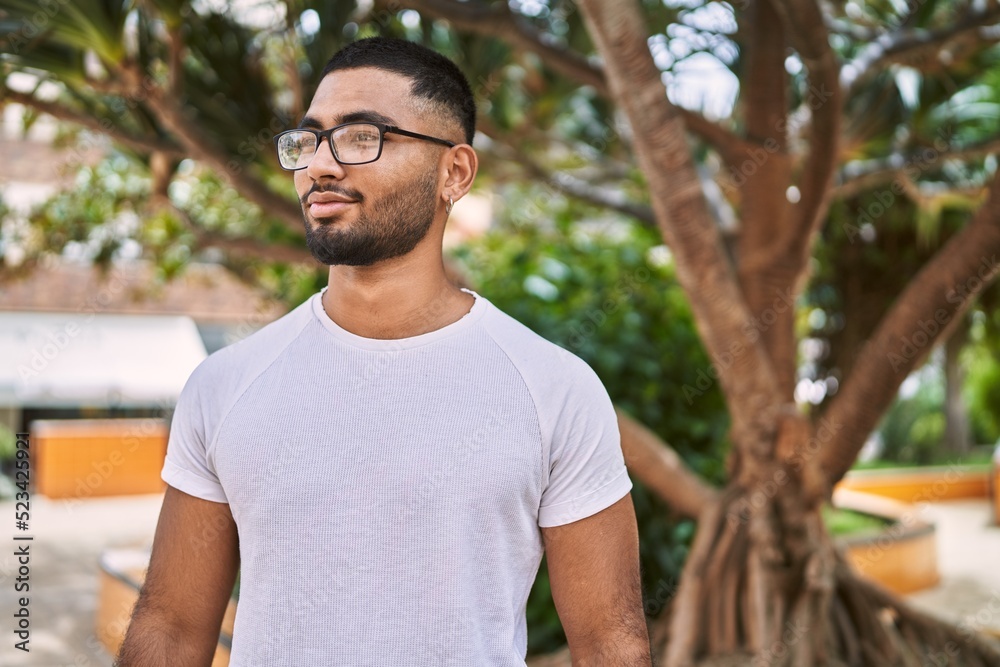 Young middle east man smiling happy standing at the city. Young middle east man smiling happy standing at the city.