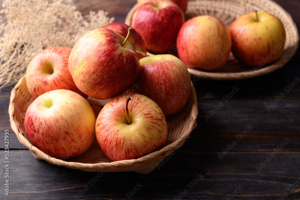 Red apple fruit in basket on wooden background, Healthy fruit Red apple fruit in basket on wooden background, Healthy fruit
