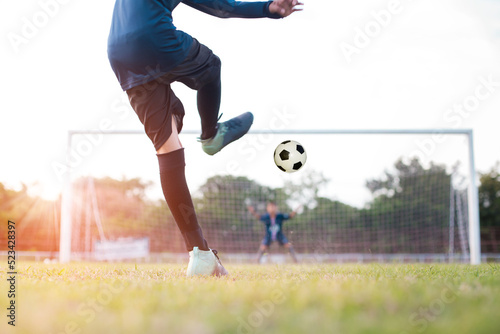 team soccer footballer get the ball to free kick or penalty kick during match in the stadium photo