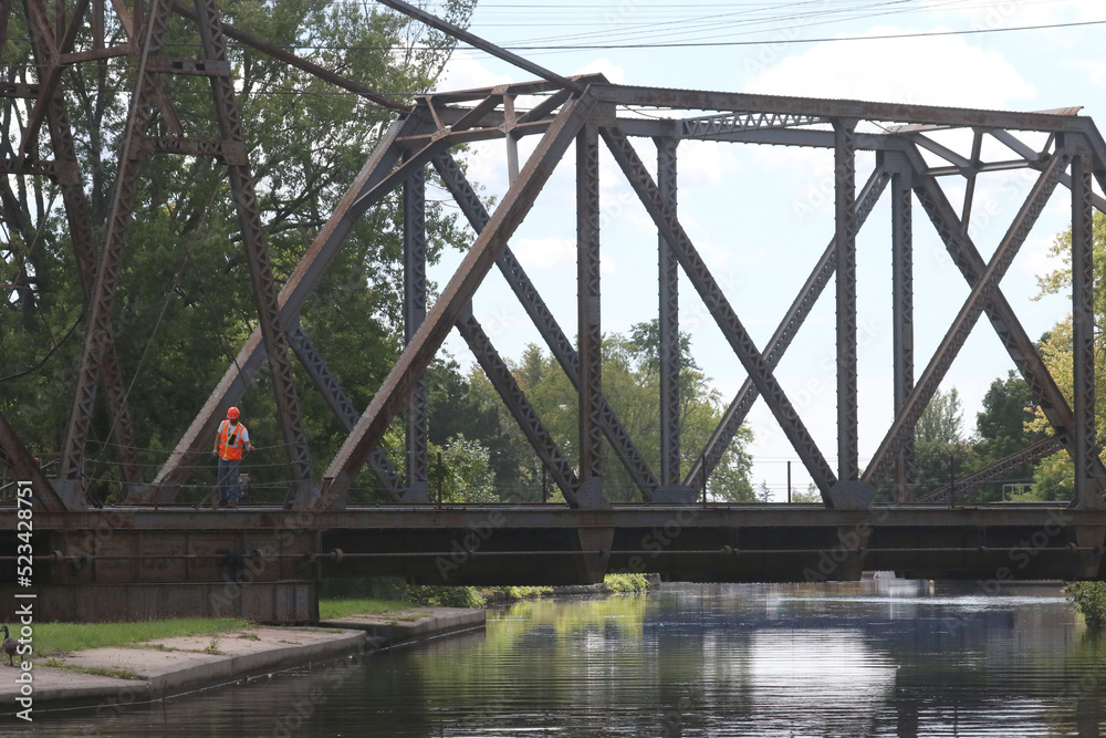 Railway swing bridge put back into position to allow boats to go up channel. Train went through two minutes ago. Cranked by hand. Railway swing bridge put back into position to allow boats to go up channel. Train went through two minutes ago. Cranked by hand.