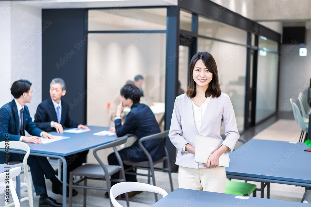 A Career Woman Working in an Office