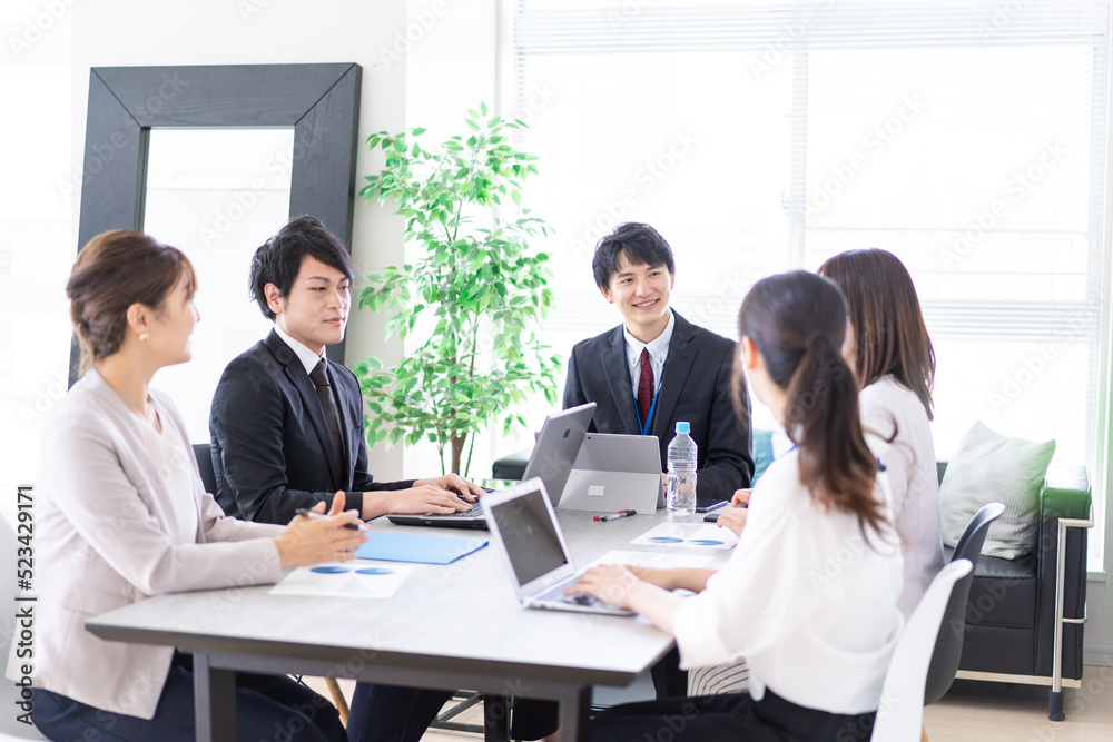 Staff having a meeting in the office