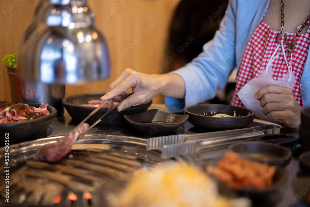Belly pork, ready to grill on fire with korean style barbeque, eat with vegetable and slide food. Food issue Belly pork, ready to grill on fire with korean style barbeque, eat with vegetable and slide food. Food issue
