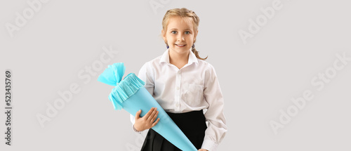 Cute little girl with schoo...