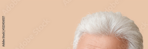 Senior man with grey hair o...