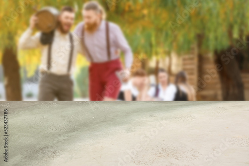 Drunk men with beer celebra...