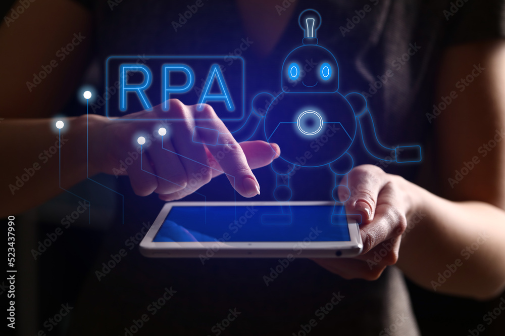 Woman using tablet computer, closeup. RPA concept Woman using tablet computer, closeup. RPA concept
