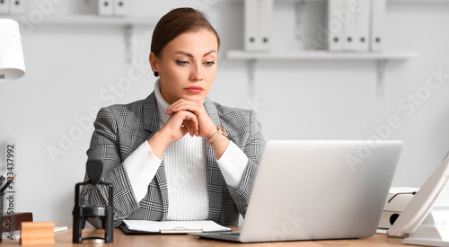 Female notary public workin...