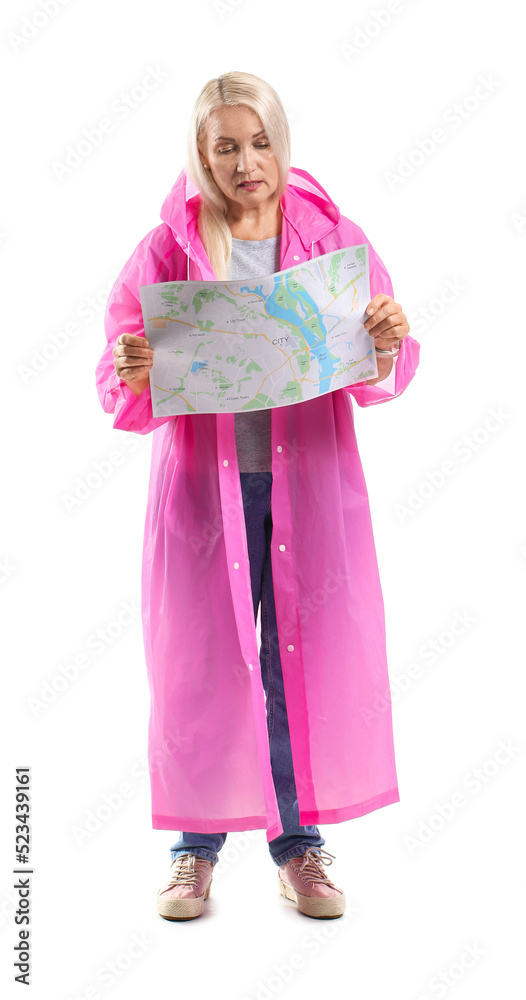 Mature woman in raincoat with city map on white background Mature woman in raincoat with city map on white background
