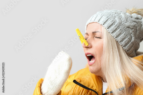 Ill mature woman with cloth...