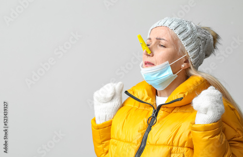 Ill mature woman with cloth...