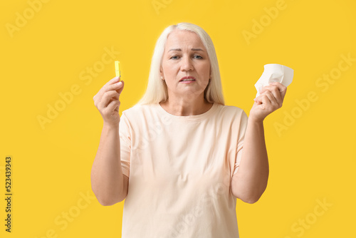 Ill mature woman with cloth...