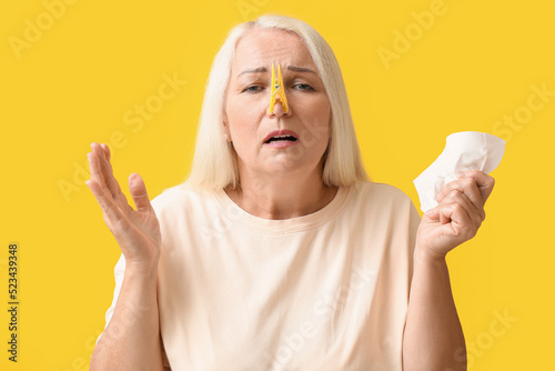 Ill mature woman with cloth...