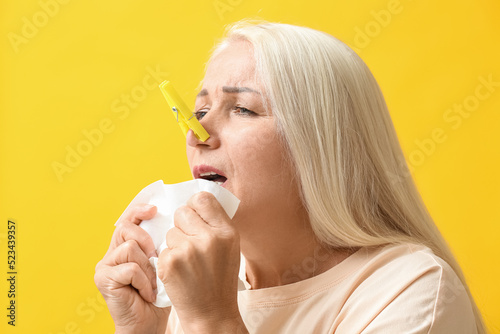 Ill mature woman with cloth...