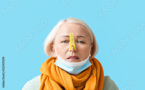 Ill mature woman with cloth...