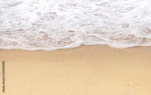 Ocean Waves Washing Onto Sandy Shore Beach