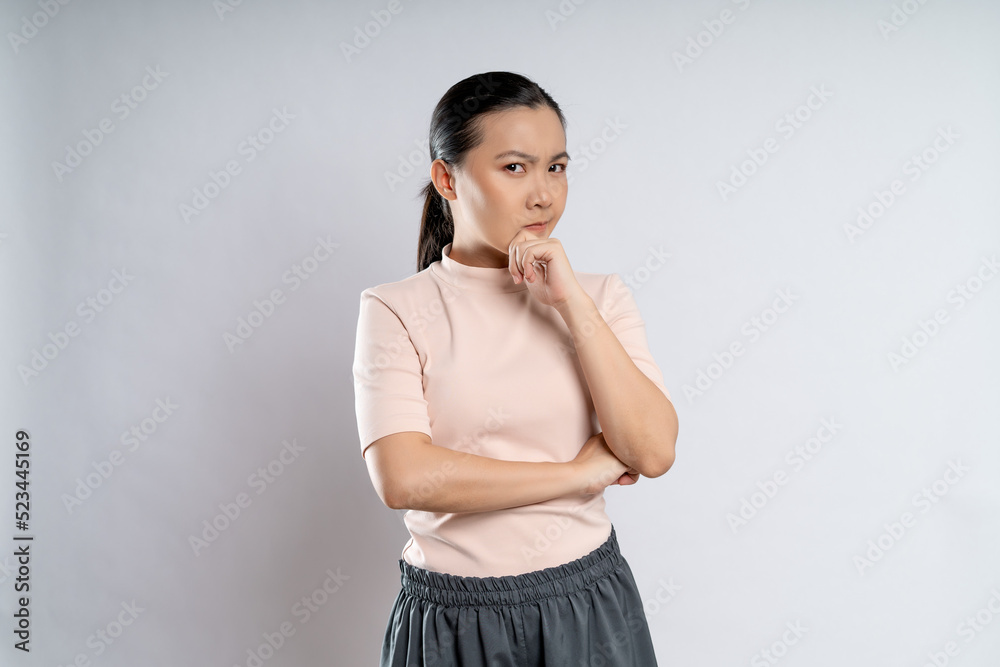 Asian woman thinking about problem, worried and confused. Asian woman thinking about problem, worried and confused.