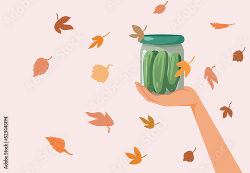 Hand Holding a Jar of Pickles in Autumn Background Vector Illustration. Housewife storing cucumbers during autumn season with traditional recipe
