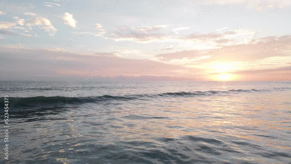 aerial slow motion of the waves at sunset and the surf on playa bandera beach in costa rica aerial slow motion of the waves at sunset and the surf on playa bandera beach in costa rica