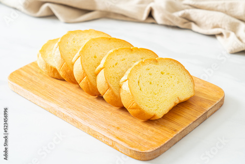 potatoes bread sliced on wood board