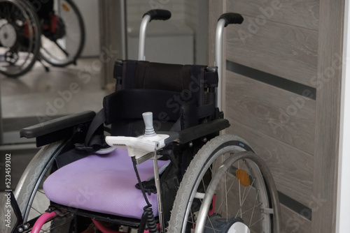 Electric wheelchair for children patient cannot walk use in home or hospital, healthy strong medical concept