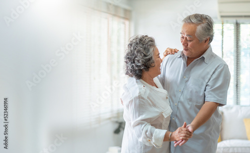 Asian Senior adult couple Celebrating Wedding Anniversary with dancing. Romance, lover.
