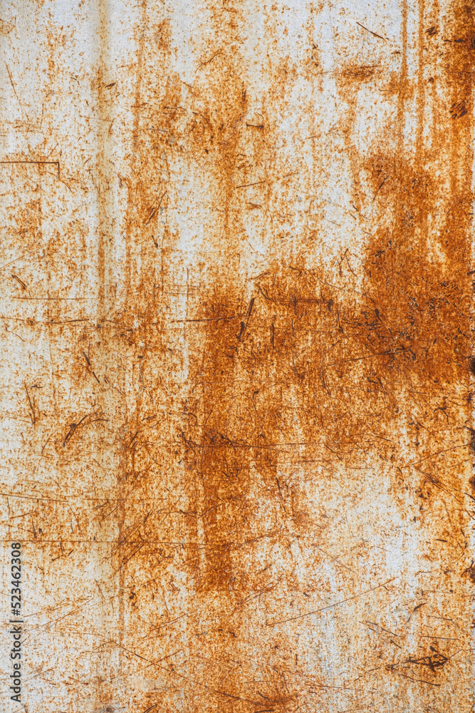 weathered and rusted white metal surface
