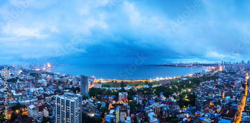 The best view of Mumbai's Back Bay and the curve of Marine Drive, as seen from a building in Marine Lines during monsoon.