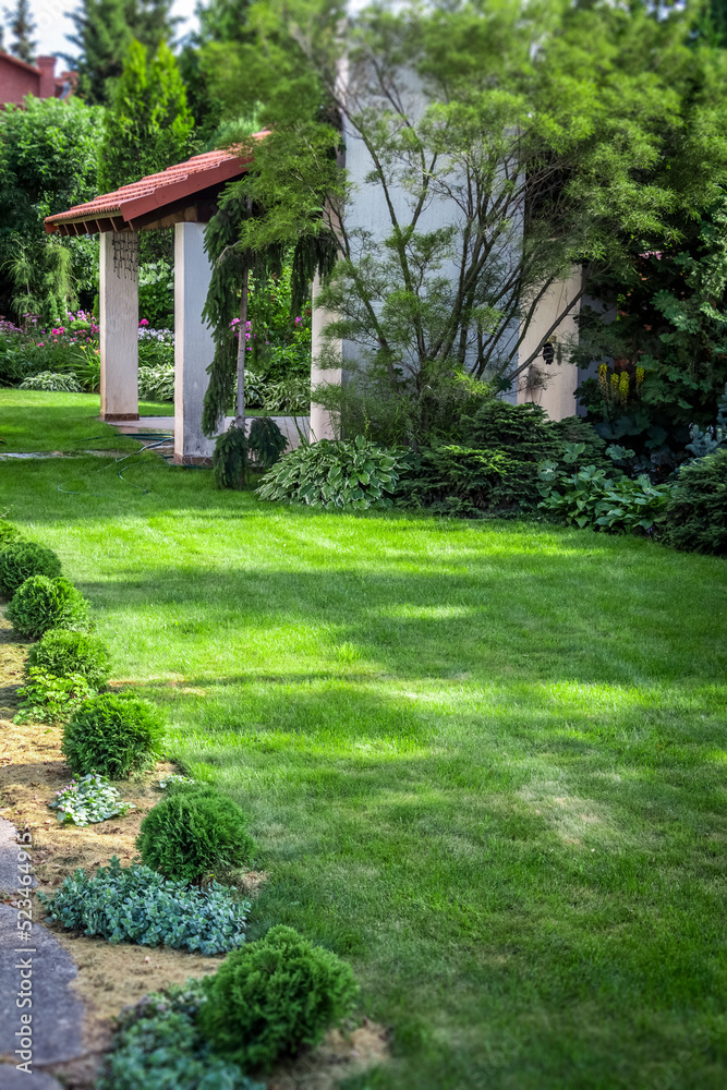 Backyard design elements of a beautiful private house.