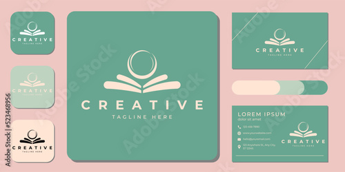 luxury and elegant gold colored pearl shell logo template and business card