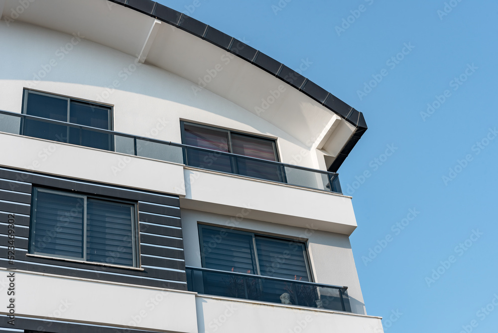 Detail of the exterior of a modern residential apartment building. Fragment of a new elite house and residential complex.