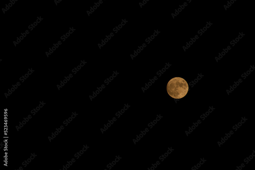 Full moon in black sky background Full moon in black sky background