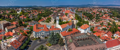 Veszprem, Hungary - Aerial panoramic view of the castle district of Veszprem with medieval buildings at Ovaros square and Fire-watch tower on a bright summer day with clear blue sky photo
