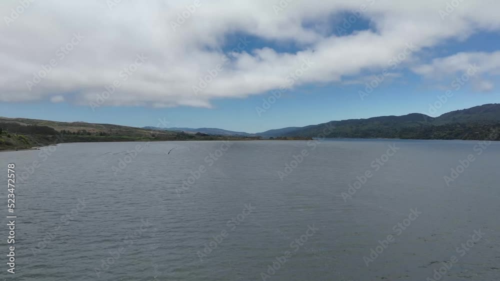 Hyper-lapse Over Bahia Tomales, Beautiful white Clouds Over Blue Calm Sea, California Hyper-lapse Over Bahia Tomales, Beautiful white Clouds Over Blue Calm Sea, California