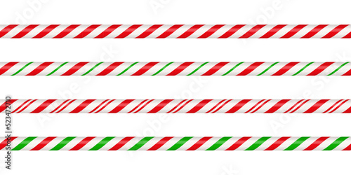 Christmas candy cane straight line border with red and green striped. Xmas seamless line with striped candy lollipop pattern. Christmas element. Vector illustration isolated on white background. photo